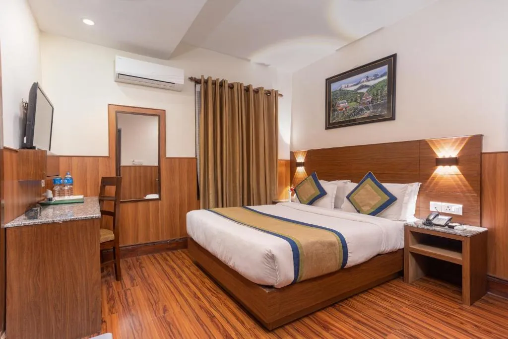 saket hall consisting of multiple decorated  chairs - The Kailash Boutique Hotel Hotel