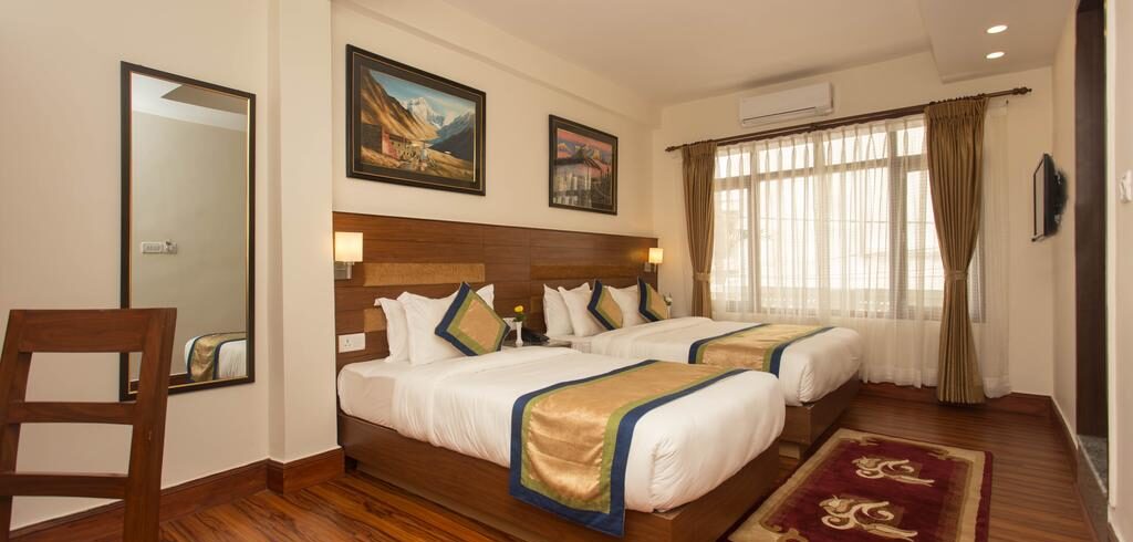 saket hall consisting of multiple decorated  chairs - The Kailash Boutique Hotel Hotel